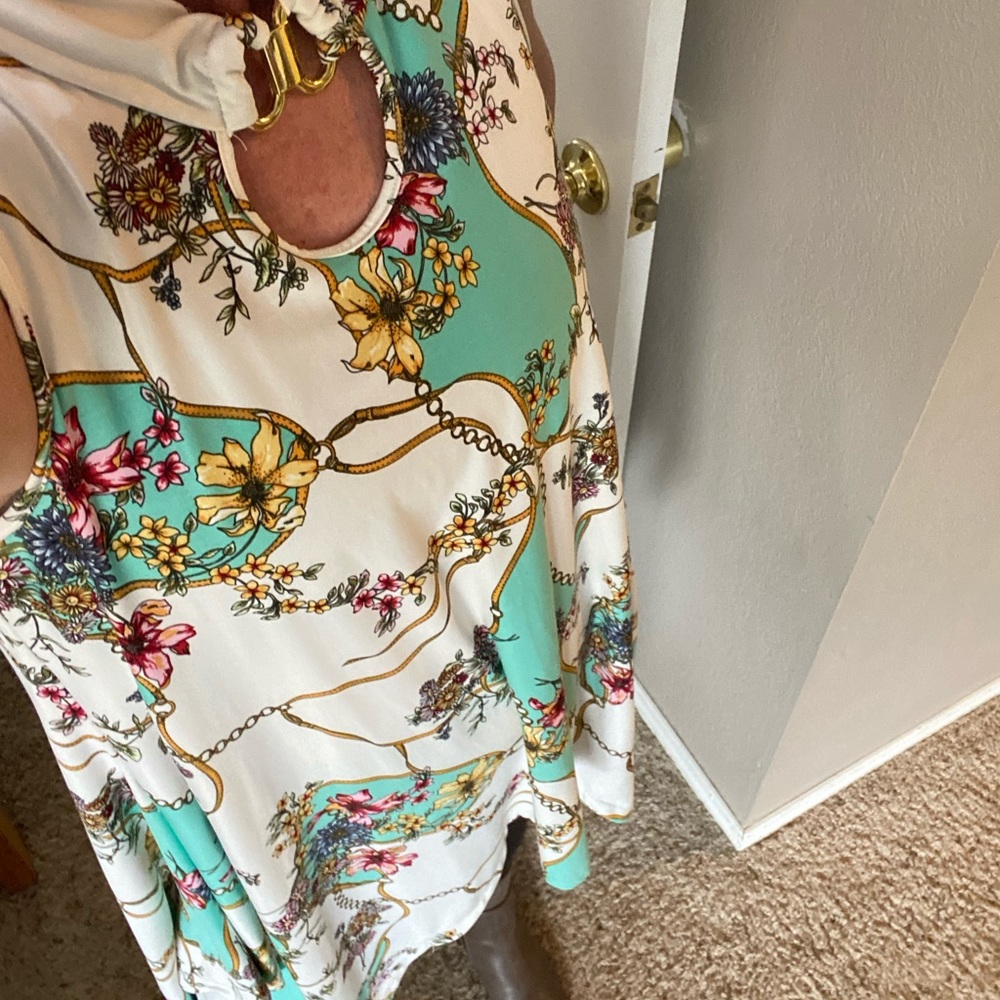 Robert Louis multi colored, sleeveless tunic.